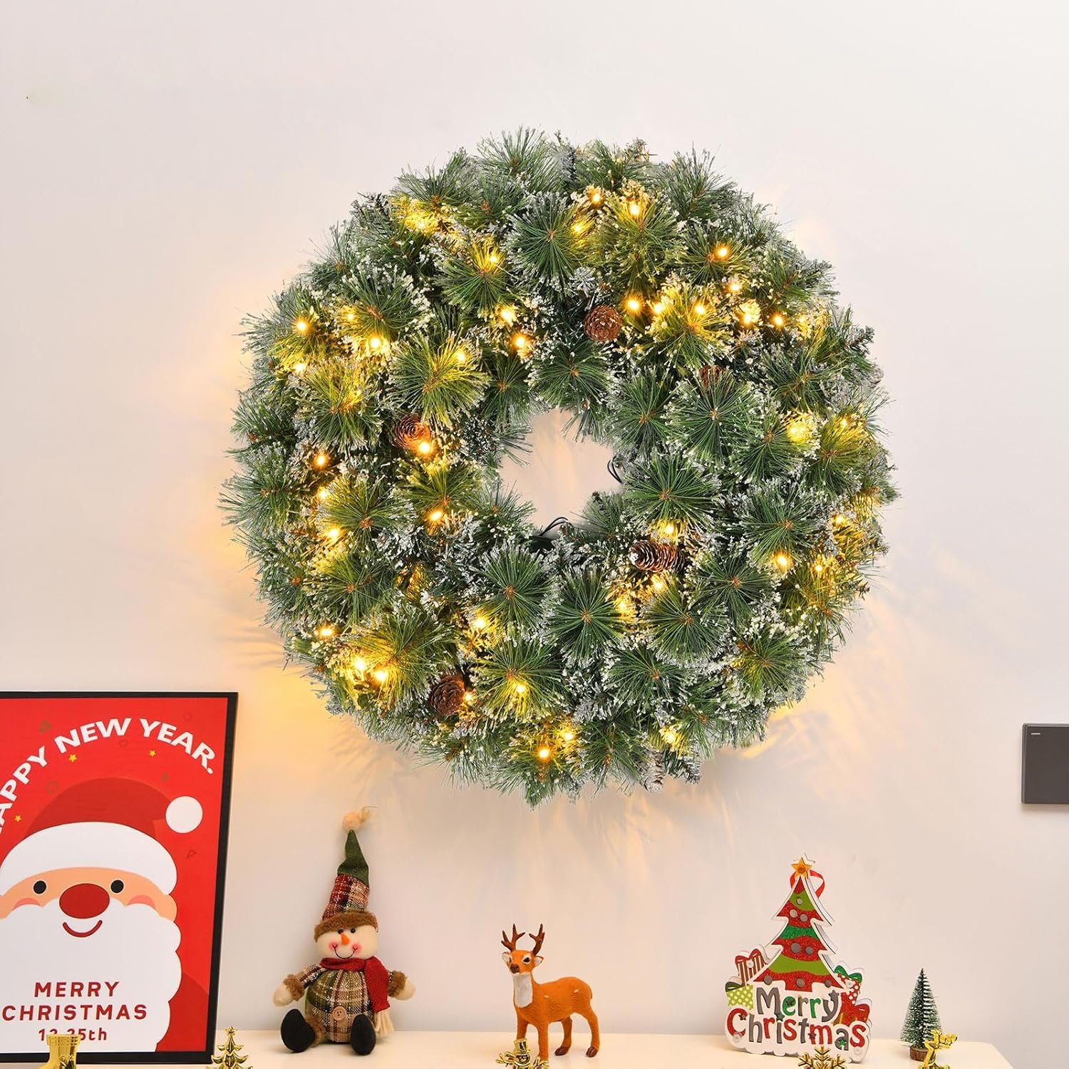 Flocked Christmas Wreath with Pinecones and Warm LED Lights, 24 in