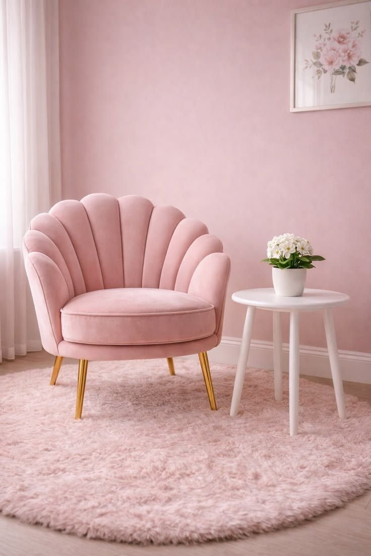 Pink accent chair and soft pink rug creating a cozy decorative corner