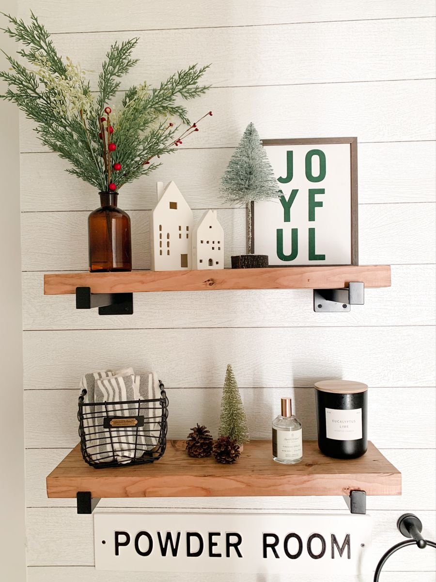 Bathroom shelf with greenery and a Joyful sign