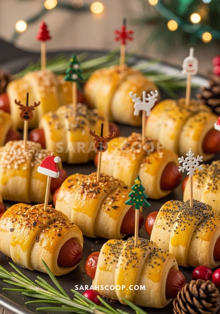 Pigs in blankets with festive holiday picks ready to bake