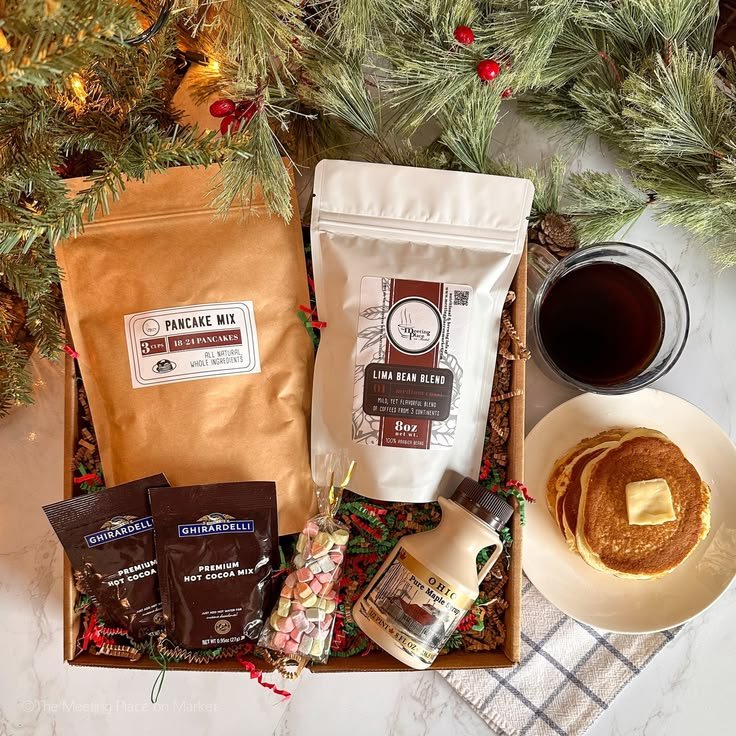 Christmas breakfast gift basket with pancake mix, coffee, and cocoa