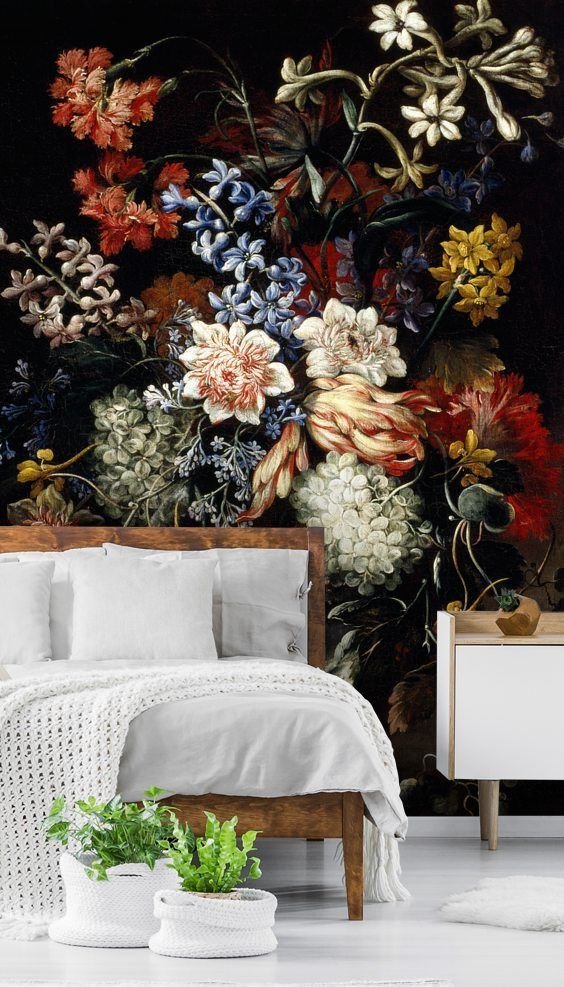 Dark vintage floral mural on a statement wall in a cottagecore bedroom