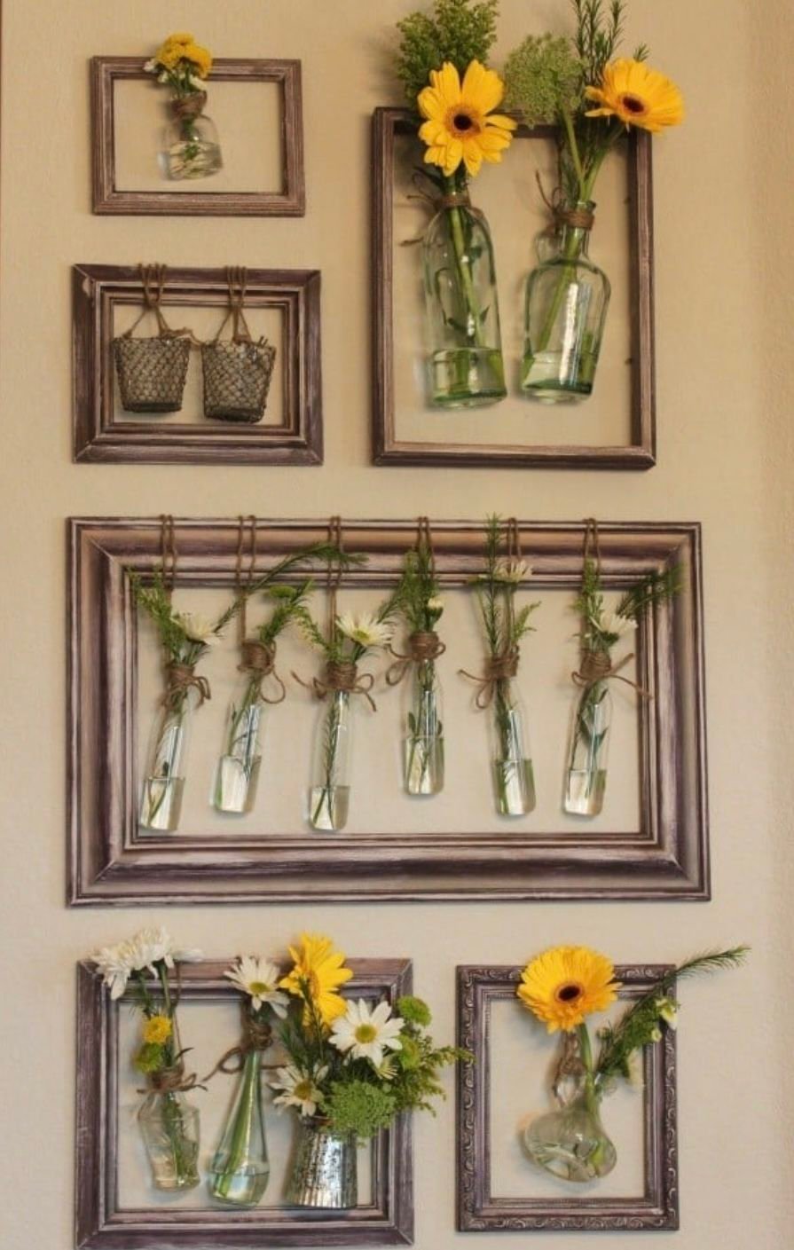 Gallery of framed pressed flowers displayed as wall art in a cottagecore bedroom