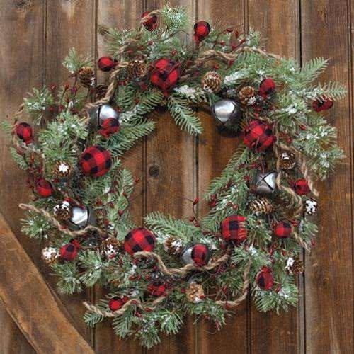 Pine wreath with buffalo plaid ribbon and gold jingle bells