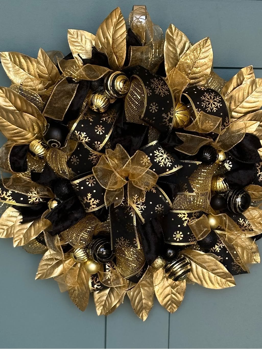 Black and gold glam Christmas wreath with mixed ribbon textures
