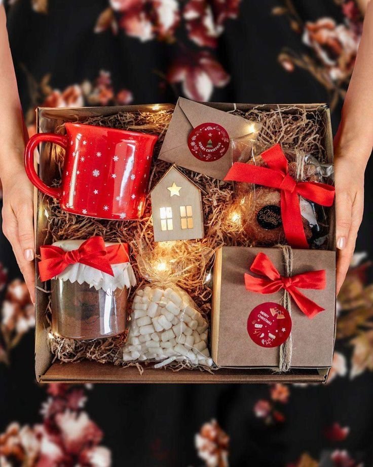 Homemade Christmas tea box filled with tea bags and small treats