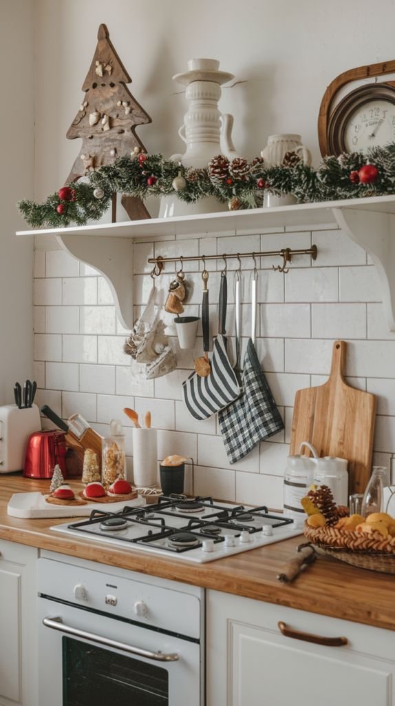 Kitchen shelf with a carved wood tree, vintage clock, and garland