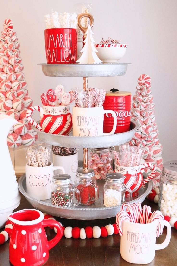 Galvanized metal tiered tray styled as a red and white hot cocoa bar