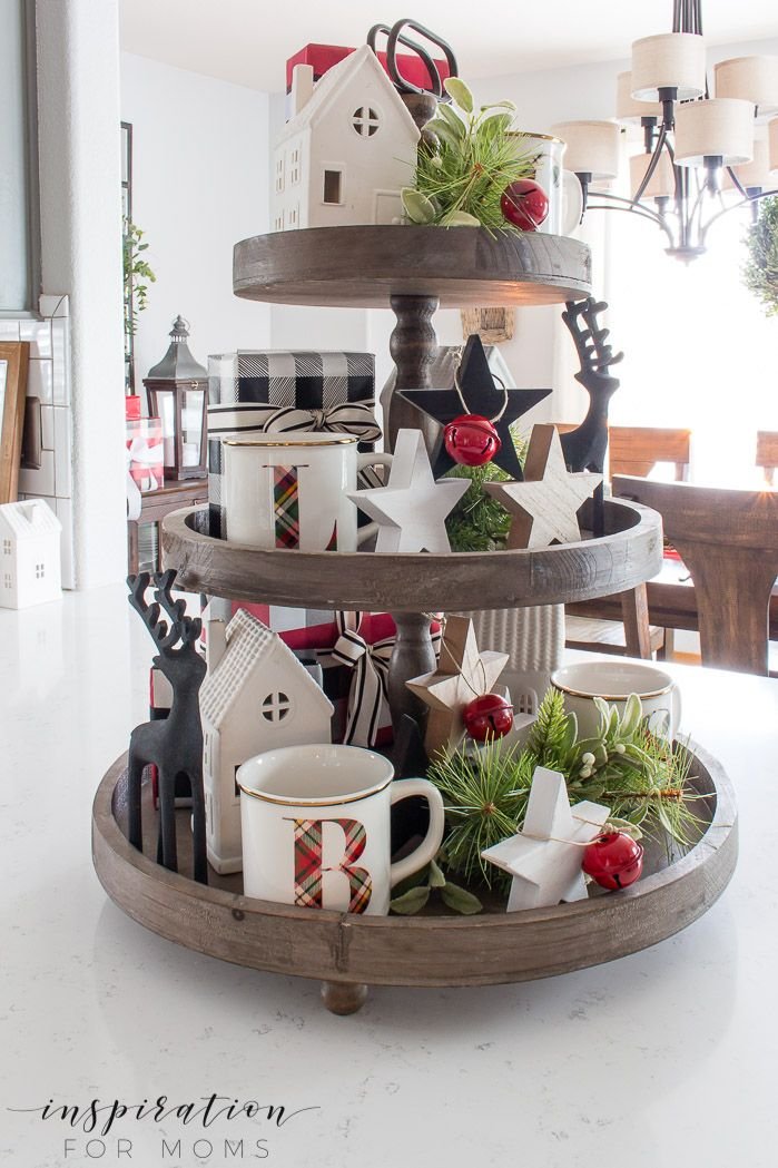 Wood tiered tray with a monogrammed mug and black wood reindeer silhouettes