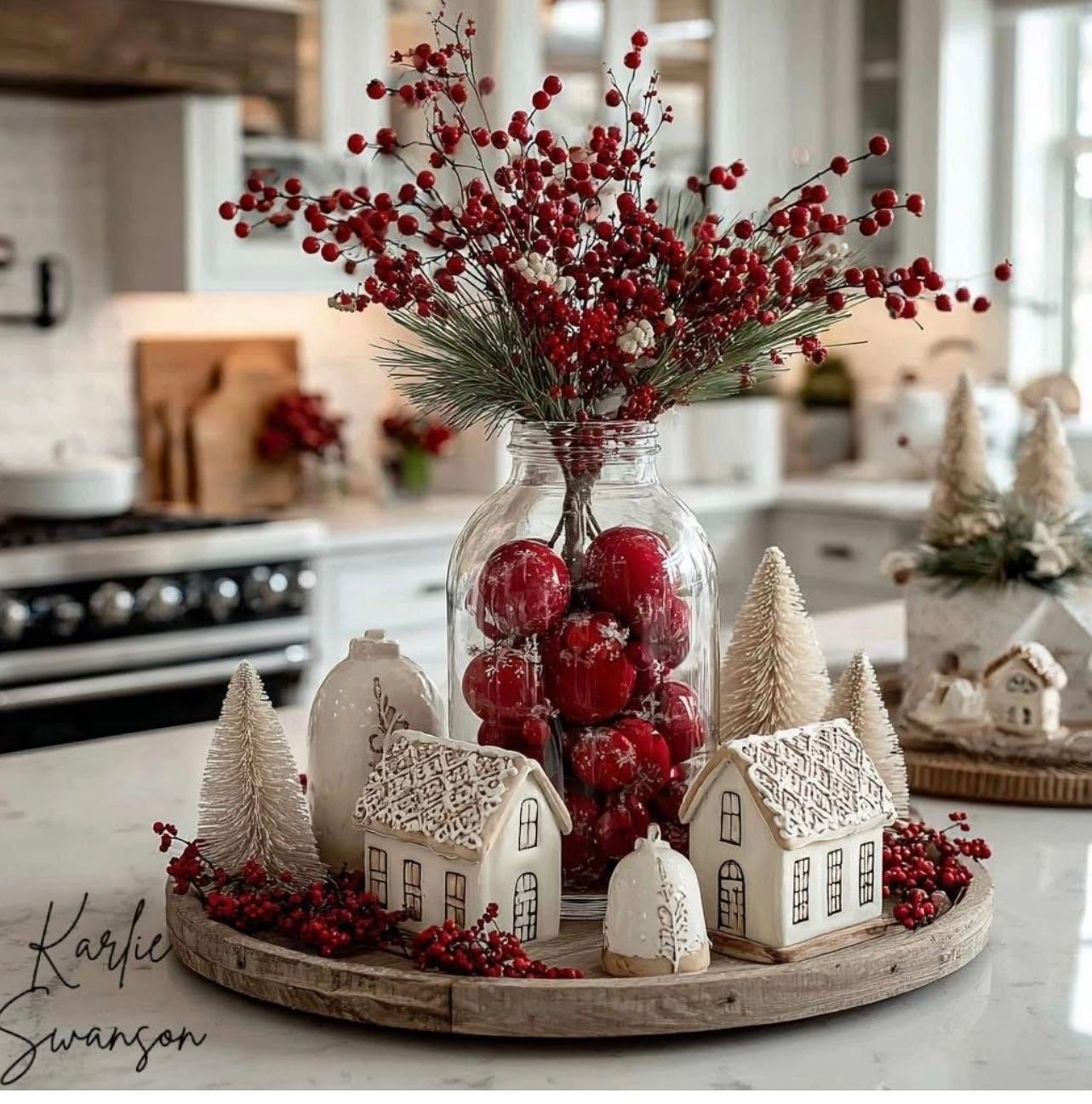 Tray with red ornaments piled into a clear glass jar