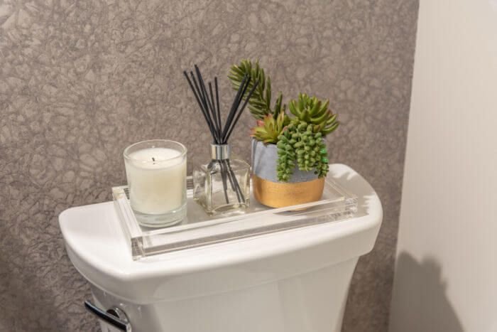 10 Toilet Tank Decor Ideas That Are Actually Cute